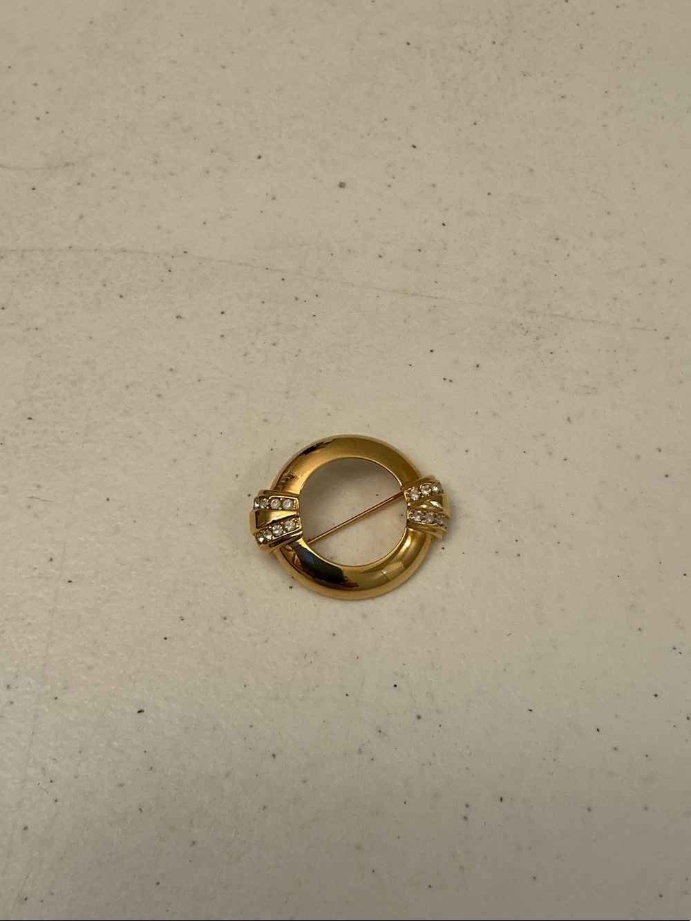 Avon 1886-1986 Gold-Tone Circular Brooch with Clear Rhinestones